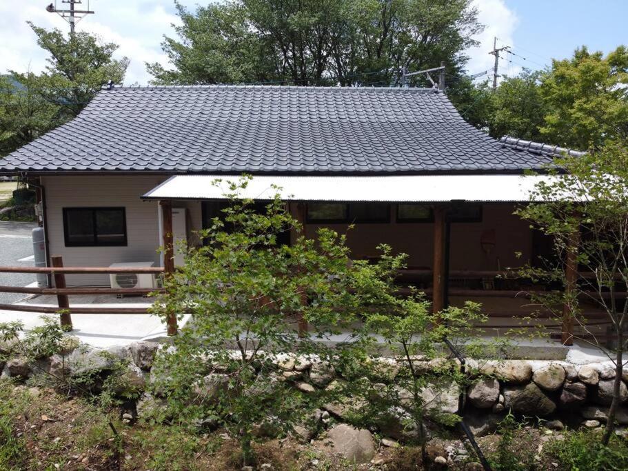 【コテージくぎの】大谷川沿いの露天風呂があるコテージ Minami Aszo Kültér fotó